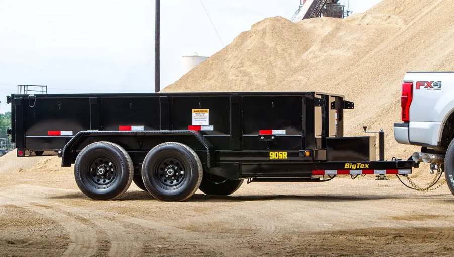 Big Tex dump trailer at a construction material yard